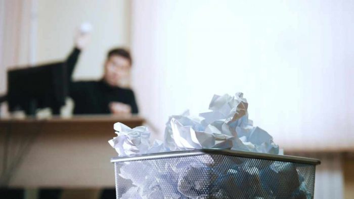 office waste bin overflowing